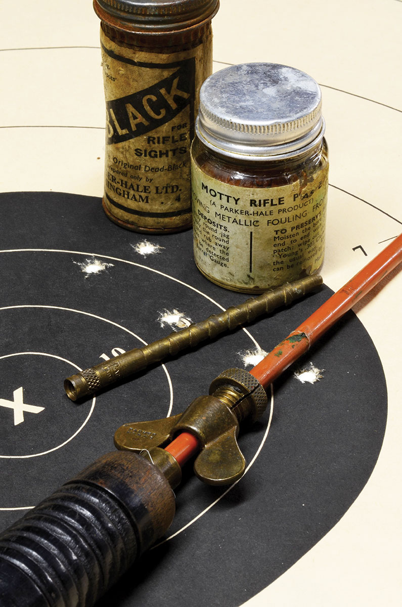 The rifle is in a British Army shipping crate, with a Parker-Hale cleaning rod and accoutrements. Parker-Hale was a mainstay of Brtish target shooting, supplying a wide range of rifles, sights and cleaning equipment, from the 1800s until its sale in 1990. Parker-Hale cleaning rods and fittings are highly prized.